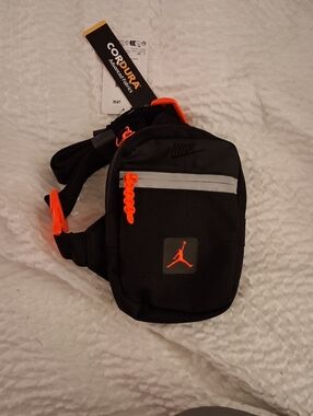 Jordan Black Sling Bag with Bright Orange Details